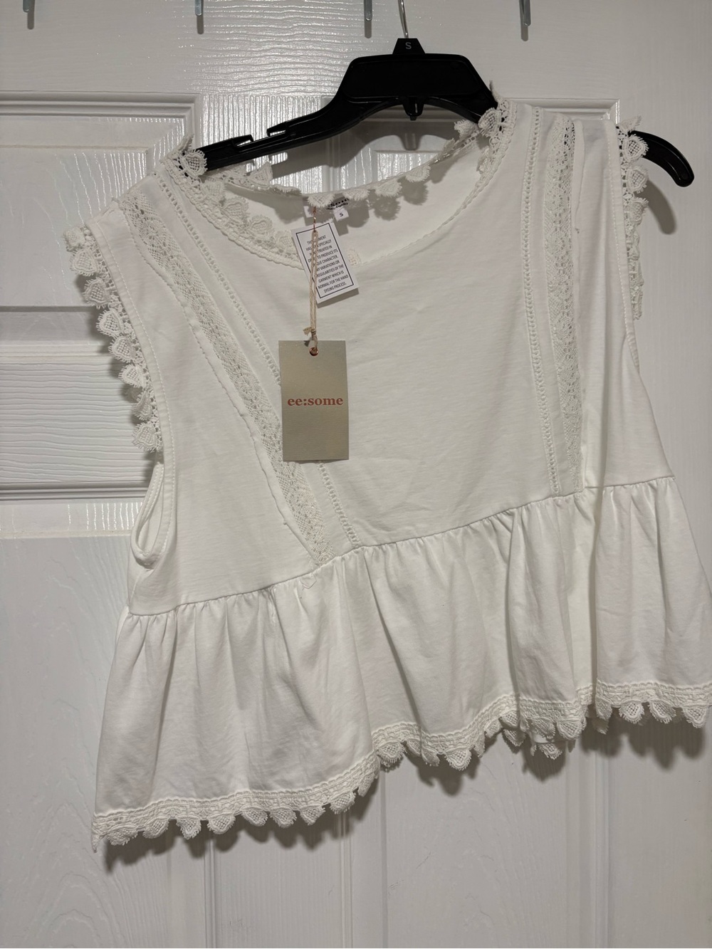 eesome Ivory Crochet-Trim Peplum Sleeveless Top